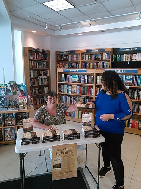 Book Signing Event of much-admired Author Robin Cannon at Book Warehouse –Clinton